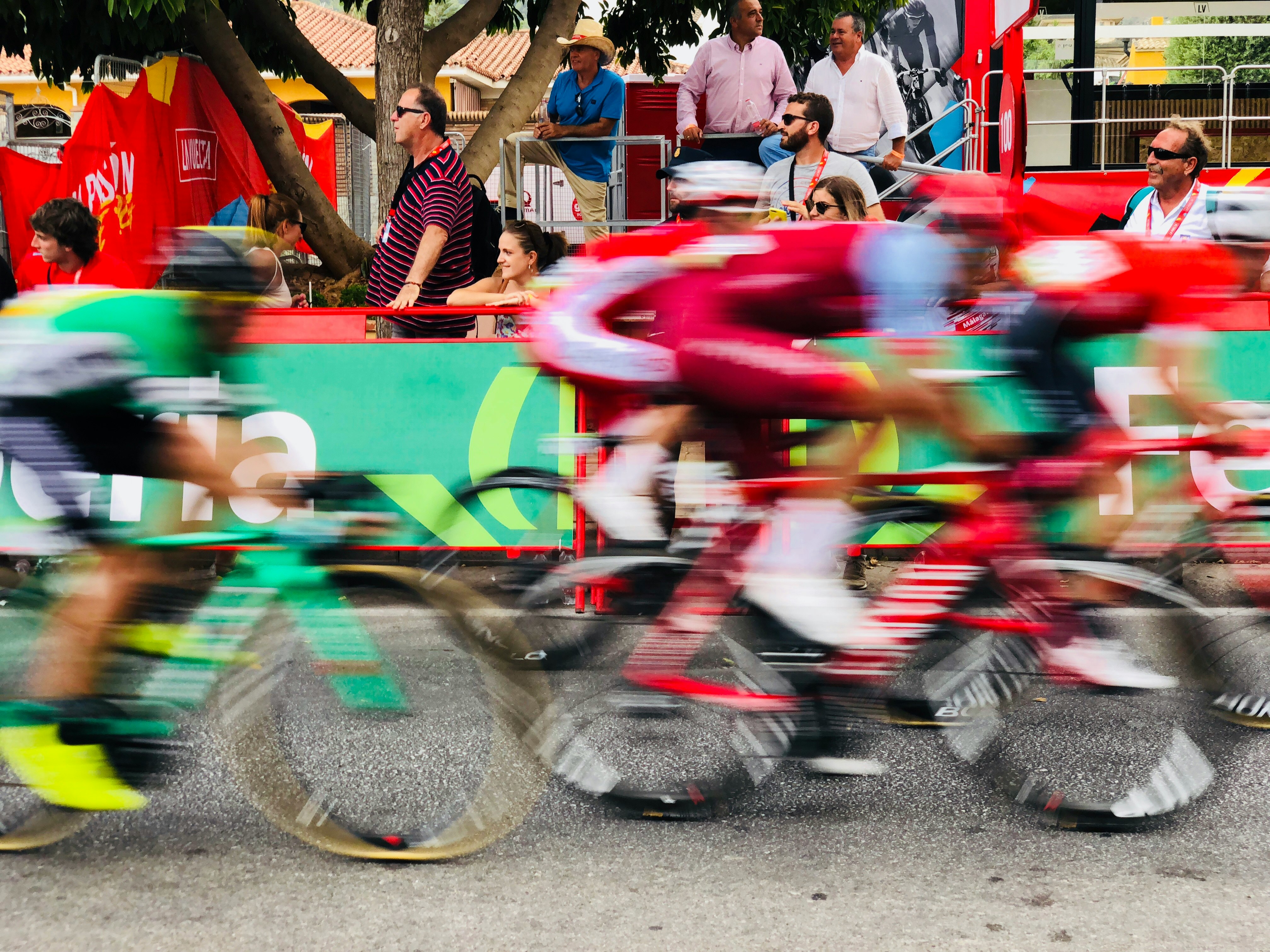 time lapse photography of bikers in marathon